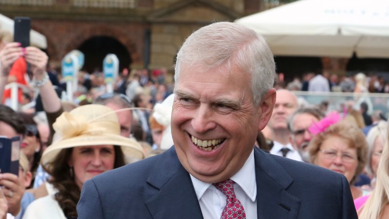 Prince Andrew smiles at the crowd at a British royal event
