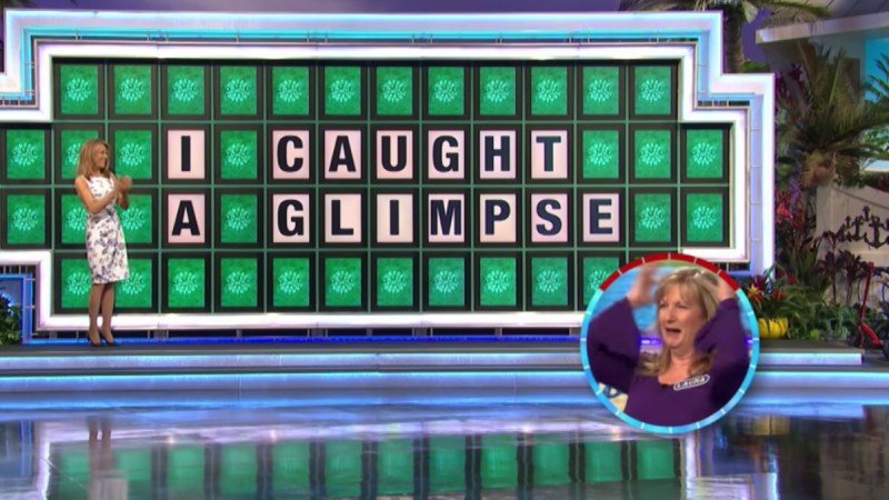 Laura Trammell wins the bonus round puzzle as Vanna White applauds her