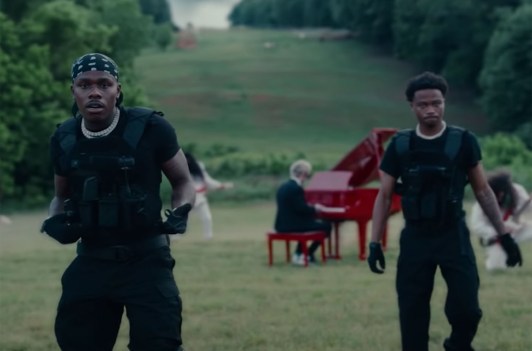 Dababy and Roddy Ricch in black tactical gearin the "Rockstar" music video.