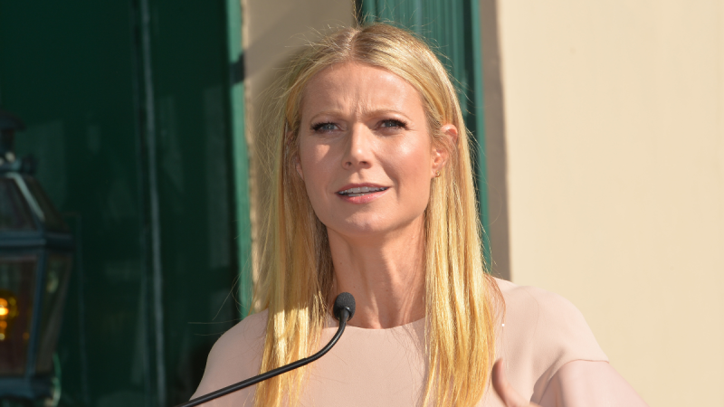 Gwyneth Paltrow wears a beige dress as she speaks at her Hollywood Star Of Fame ceremony