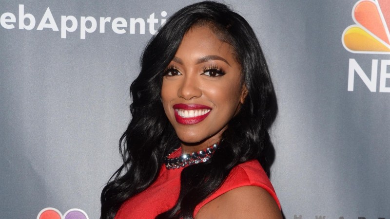 Porsha Williams wears a red dress on the red carpet