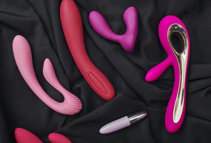 Collection of vibrators on a dark background.