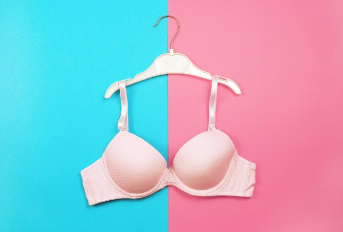 Cover image of a bra on a colorful background.