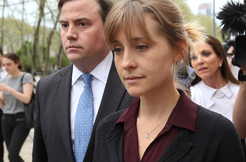 Allison Mack walking out of court.