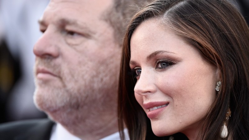 Harvey Weinstein and Georgina Chapman stand together at a movie premiere