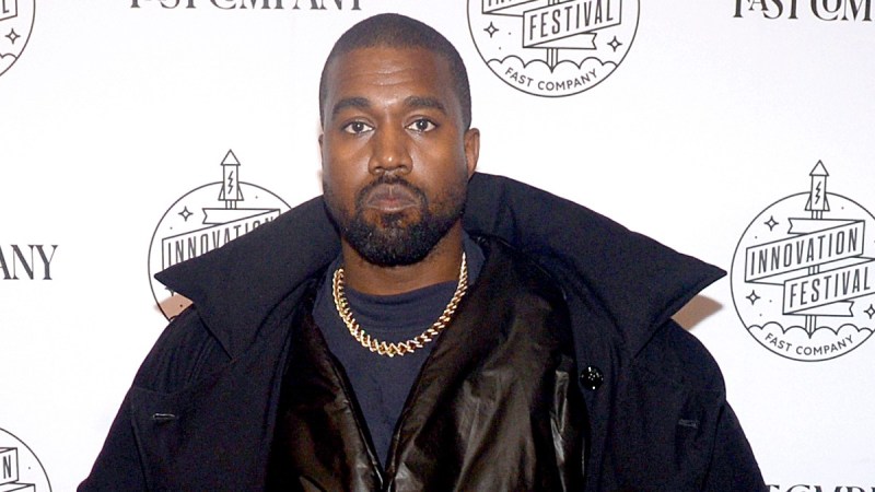 Kanye Wests wears a number of black jackets on the red carpet