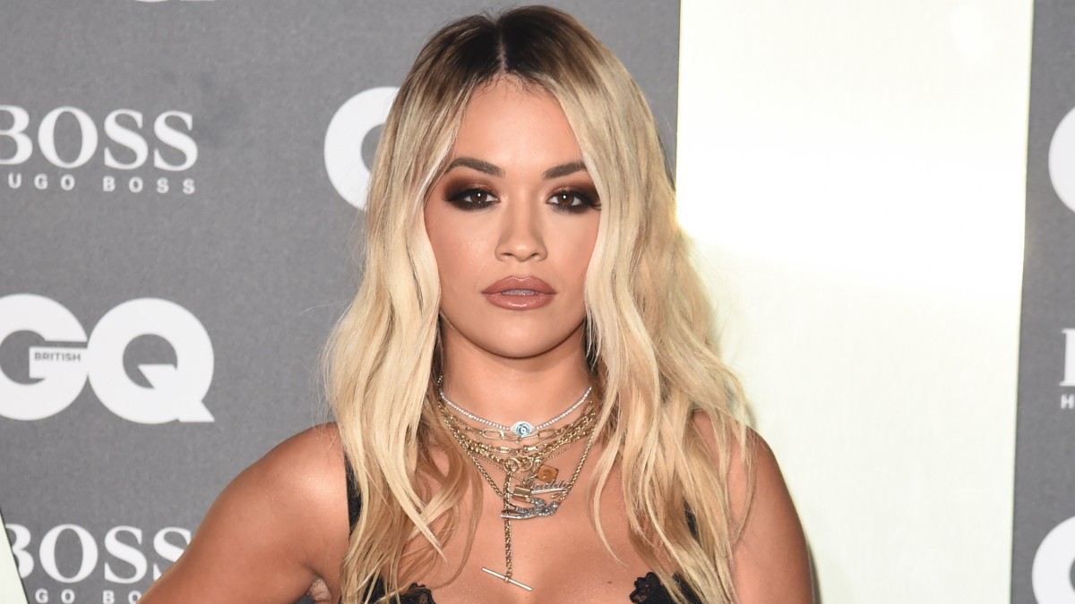 Rita Ora wears a black dress on the red carpet