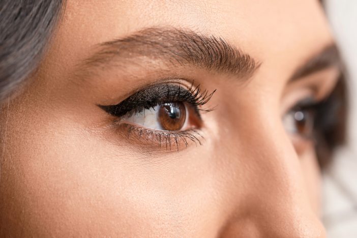 Upclose image of woman's winged eyeliner.