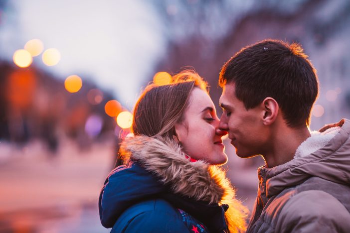 Image of couple kissing.