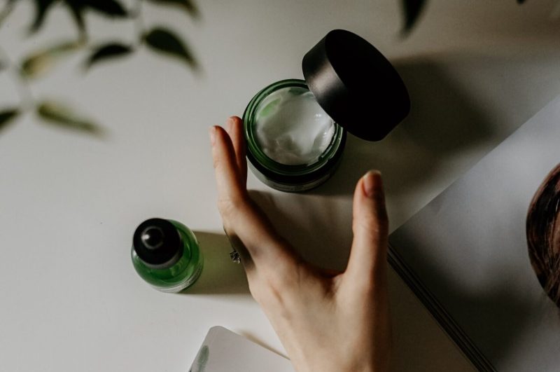 Image of green skincare in jar.