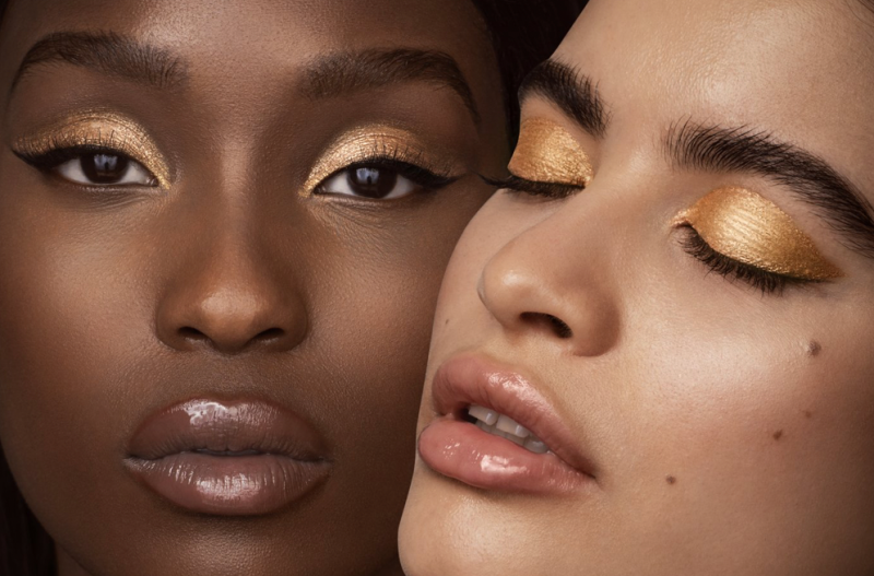 Image of two women modeling CTZN Cosmetics products.