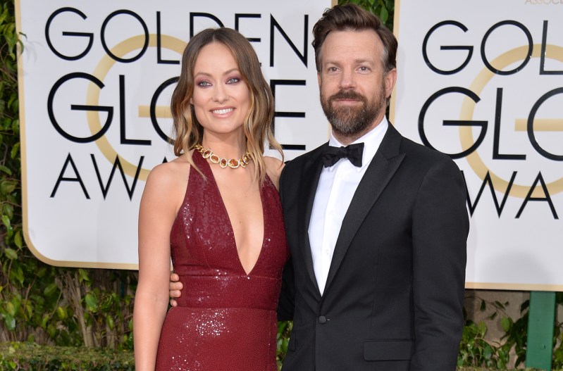 Olivia Wilde in a red dress, Jason Sudeikis in a tux on the right