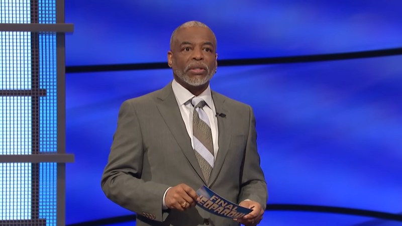 LeVar Burton hosts Jeopardy! against a blue background on the iconic set