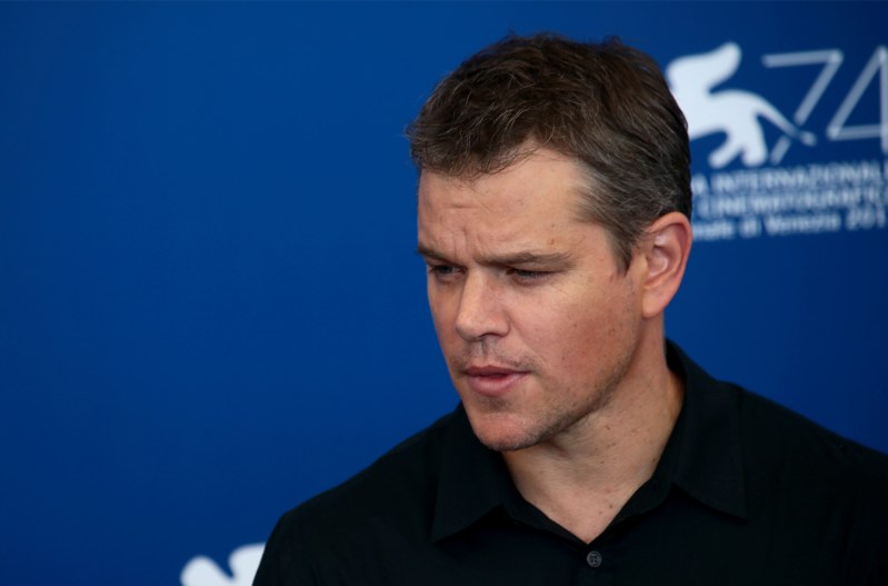 Matt Damon looking down