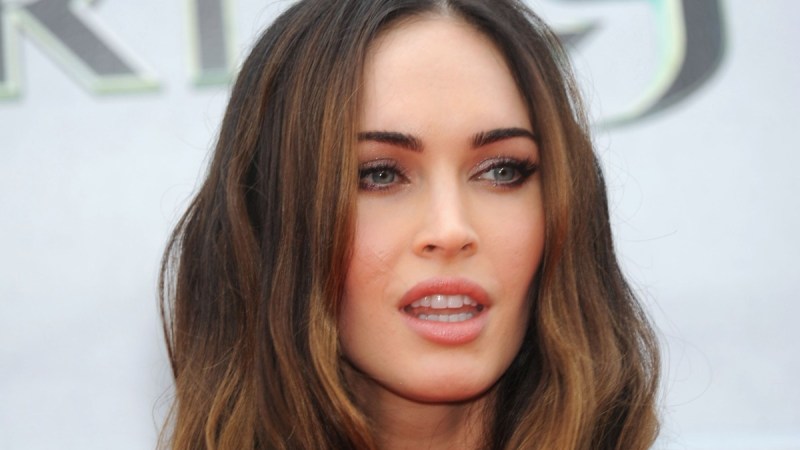 Megan Fox wears a white dress on the red carpet