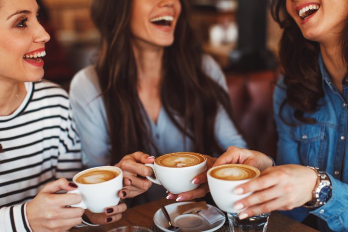 Image of three women drinking coffee.