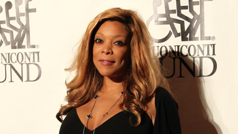 Wendy Williams wears a black dress on the red carpet