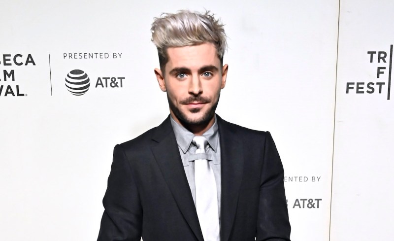 Zac Efron in a black suit