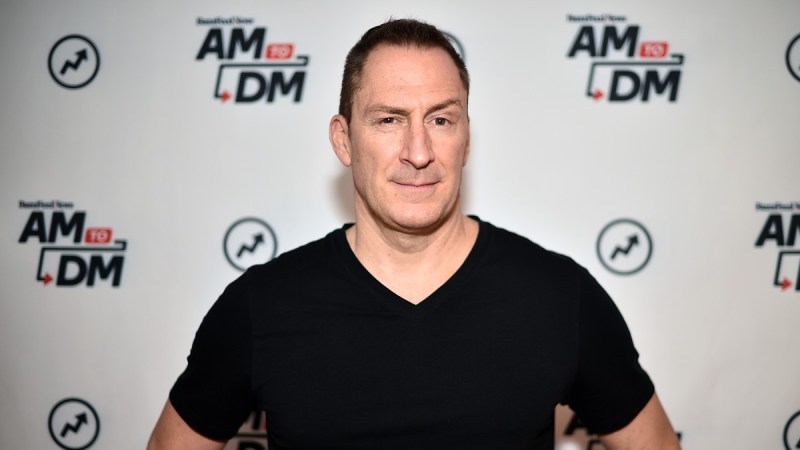 Ben Bailey wears a black t shirt on the red carpet