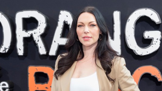 Laura Prepon wears a tan suit on the red carpet