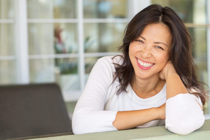 Image of mature woman smiling.
