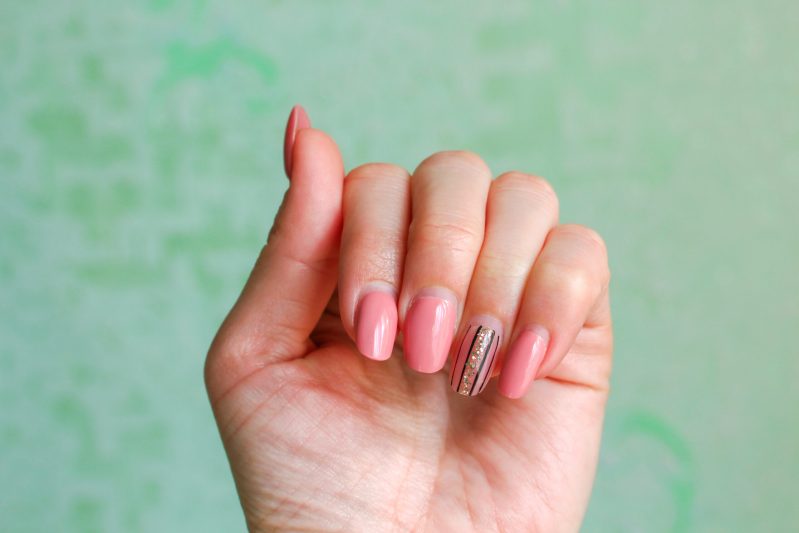 Image if outgrown acrylic nails.