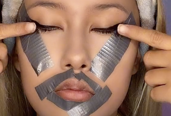 Image of girl with duct tape and makeup