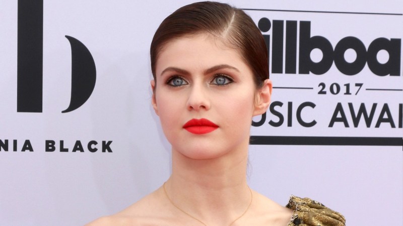 Alexandra Daddario wears an off the shoulder dress on the red carpet