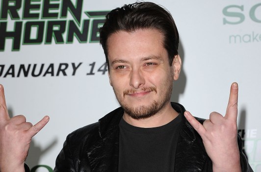 Edward Furlong making a gesture with his hands.