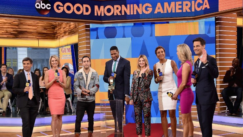 The anchors of Good Morning America gather together on stage