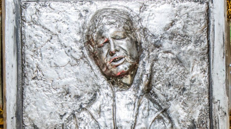Star Wars Han Solo played by Harrison Ford frozen in carbonite