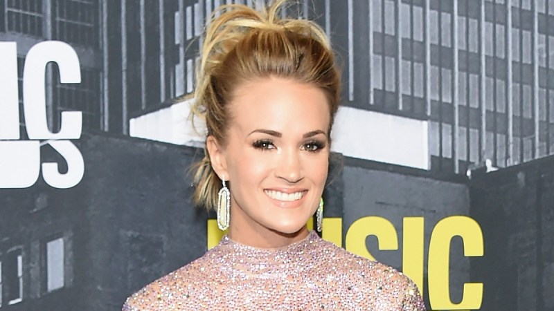 Carrie Underwood wears her hair up and rocks a sparkly short dress on the red carpet