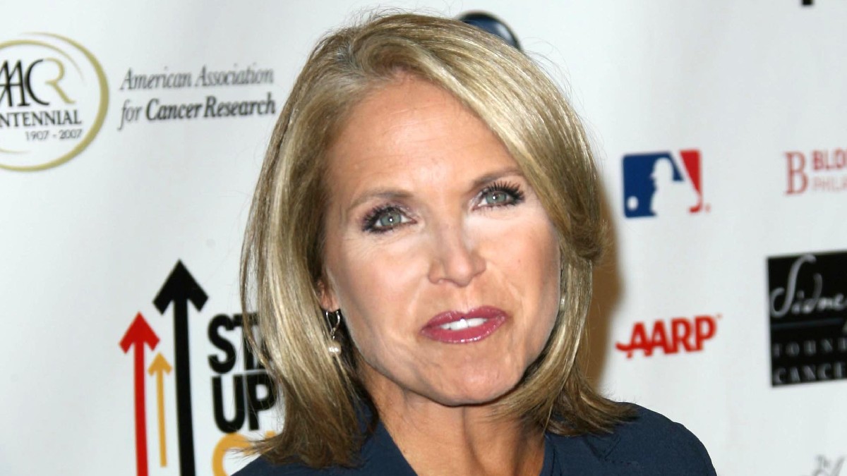 Katie Couric wears a dark blazer on the red carpet