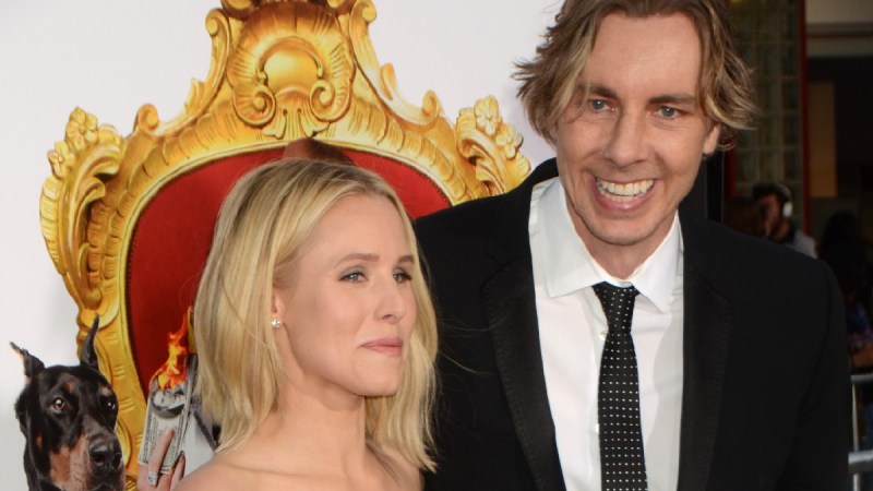 Kristen Bell and husband Dax Shepard pose together while walking the red carpet