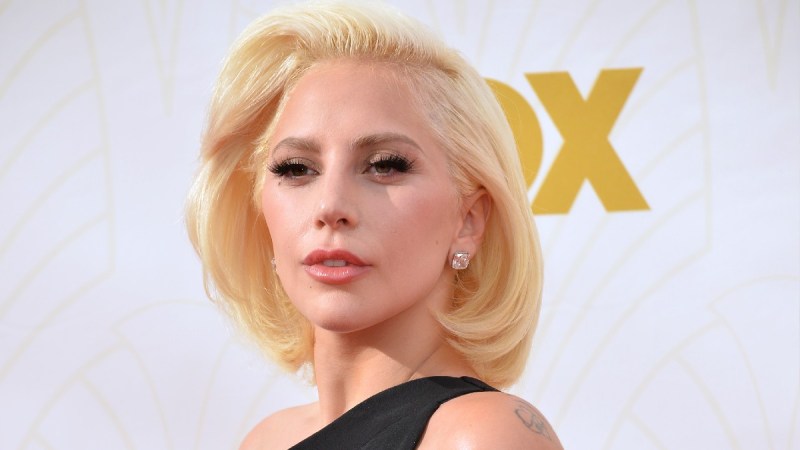 Lady Gaga wears a black dress on the red carpet