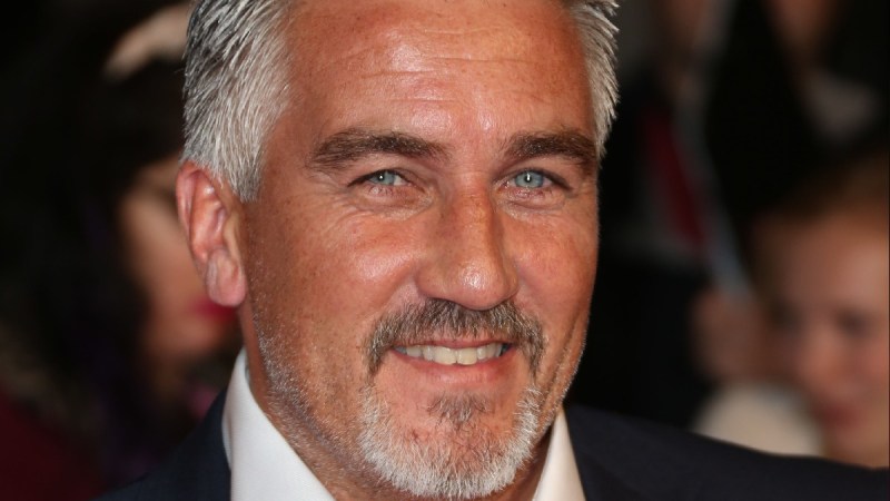Paul Hollywood wears a dark suit on the red carpet