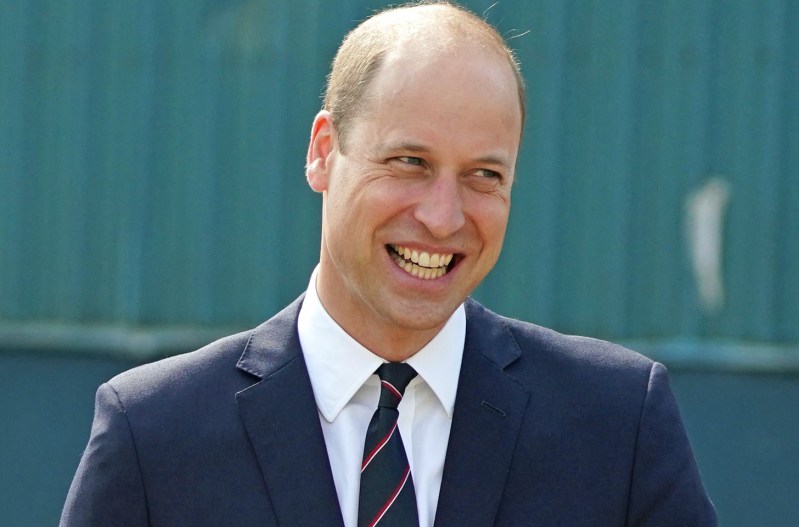 Prince William smiling awkwardly