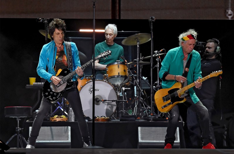 The Rolling Stones on stage in concert, From left to right, Ronnie Wood, Charlie Watts, Kieth Richards