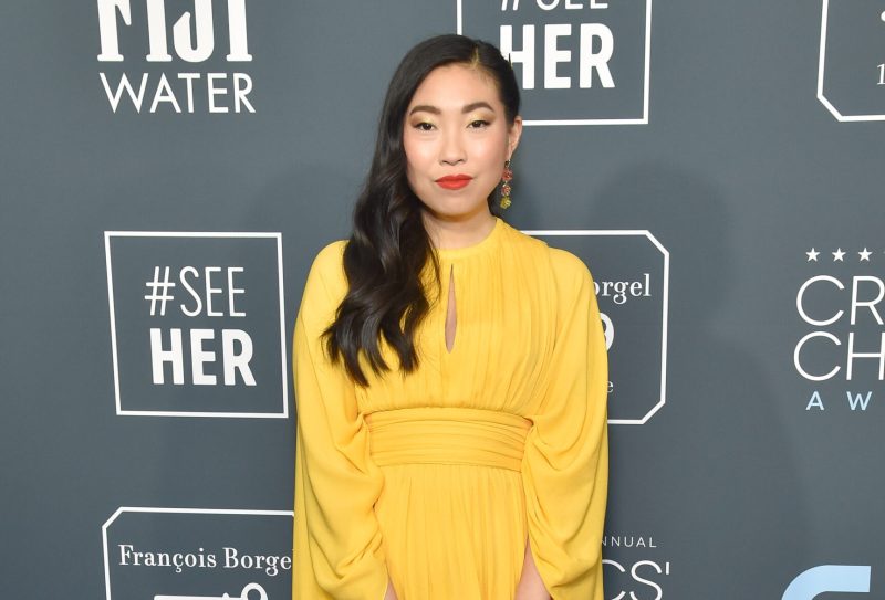 Awkwafina in a yellow dress and side-swept hair at the Annual Critics' Choice Awards.