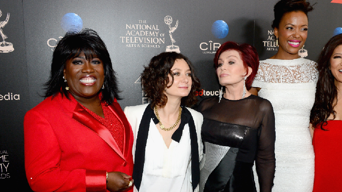 The co-hosts of The Talk pose together for photos on the red carpet