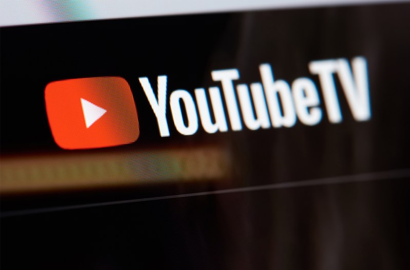 A photo of the YouTubeTV logo on a screen