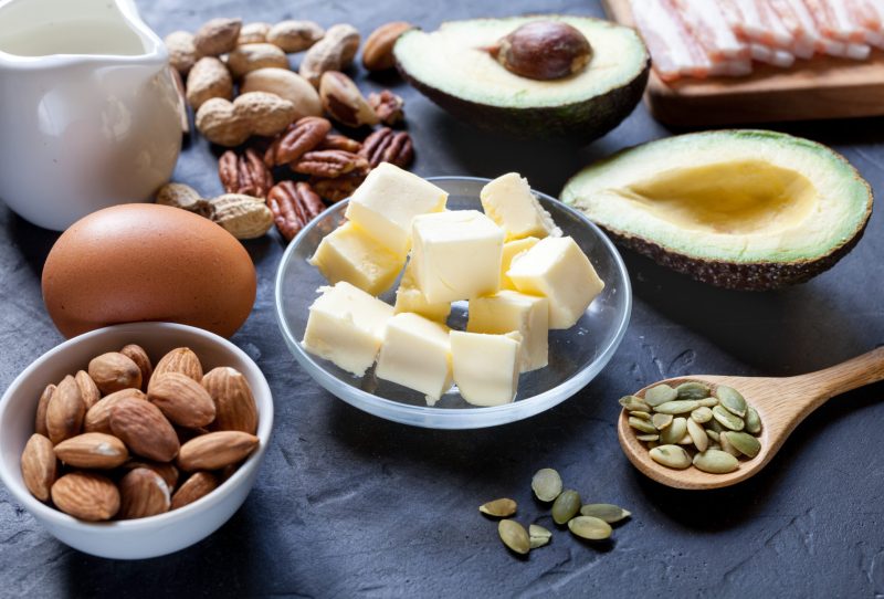 Keto-approved foods like nuts, eggs, and butter.