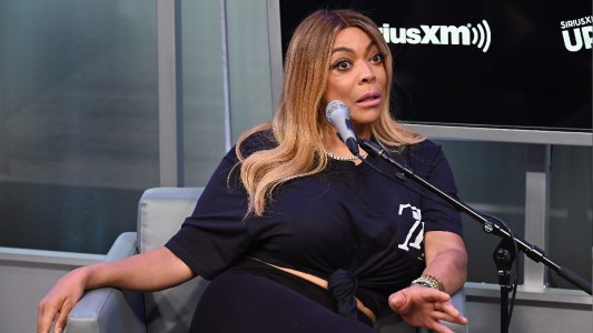Wendy Williams wears a black top and black pants during a Sirius XM interview