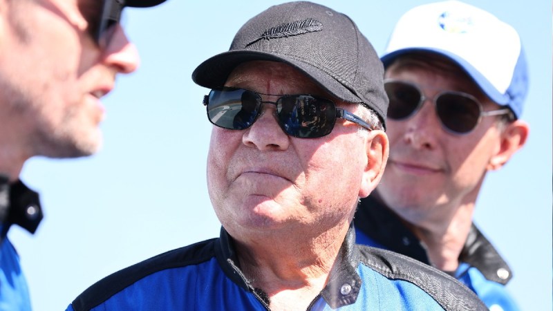 William Shatner wears a blue jumpsuit, black hat and sunglasses in Texas
