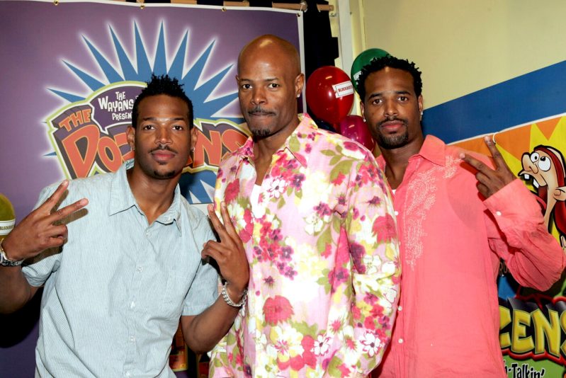 Marlon, Keenan Ivory, and Shawn Wayans promote their new game "The Dozens" in 2005.