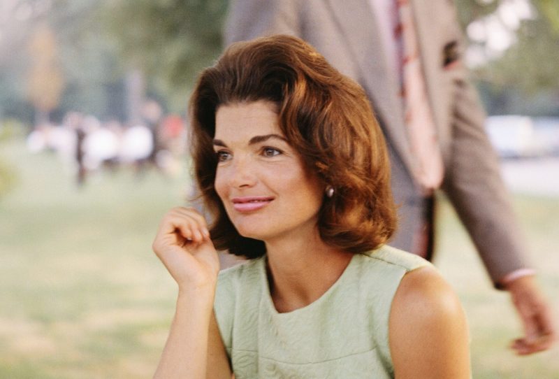 CIRCA 1960s: Former First Lady Jacqueline Kennedy enjoys herself at a picnic circa the 1960s.