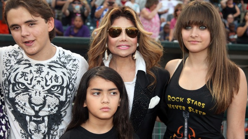 Prince, Latoya, Paris, and Bigi 'Blanket' Jackson pose together for photos