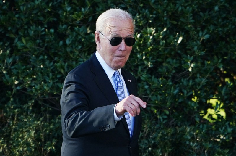 Joe Biden wearing sunglasses and pointing