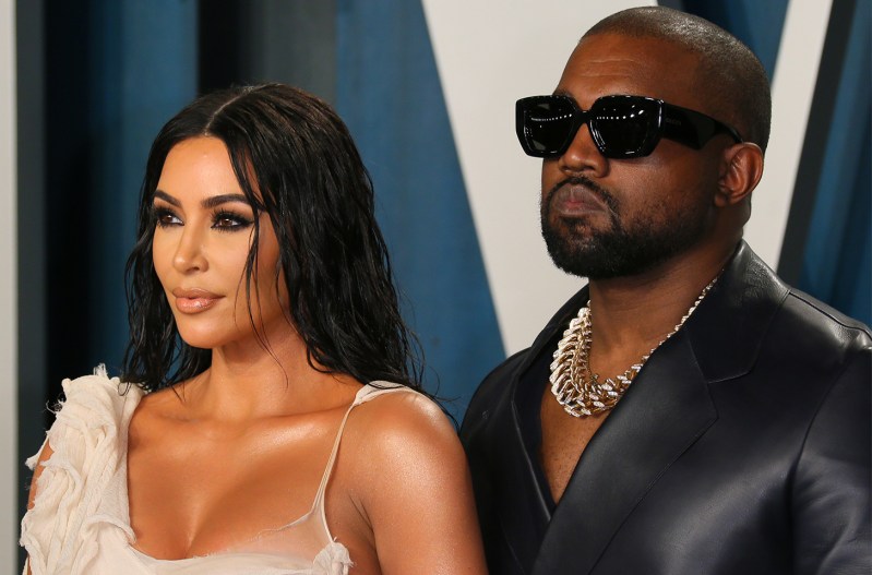 Kim Kardashian and Kanye West looking serious.