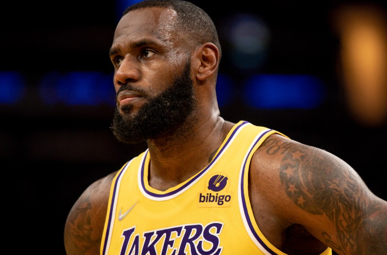 LeBron James looking serious on the court in a Lakers Uniform